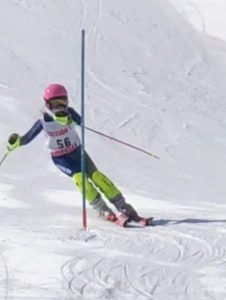 Author and expert skier Madison Feller flies down the course for sectionals.