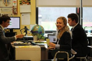 Above, the Yugoslavia crisis staff (Andrew DiFabbio, Bella DiDio, and Ben Pollak)  work on crisis updates for the Collapse of Yugoslavia.