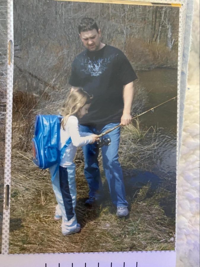 The author fishing with her dad, one of many who guided her along the way.