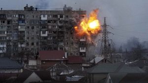 An apartment building is destroyed in an explosion in Mariupol. (Photos courtesy AP)