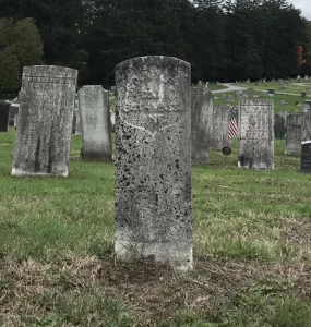 The difficult to read grave marker of Frank Meyers, located in Milltown Cemetery.