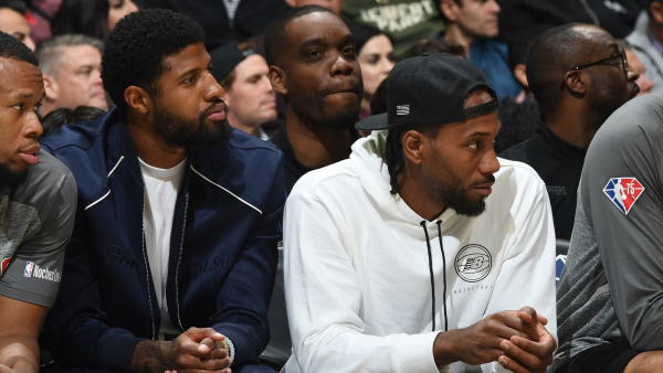 Paul George and Kawhi Leonard sit out the Los Angeles Clippers’ game on a Friday night in Minnesota for “health reasons.” (Photo credit Associated Press)
