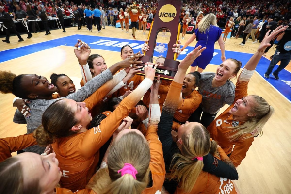 Texas players celebrate after their second title in a row is won. (Photo courtesy ncaa.com)