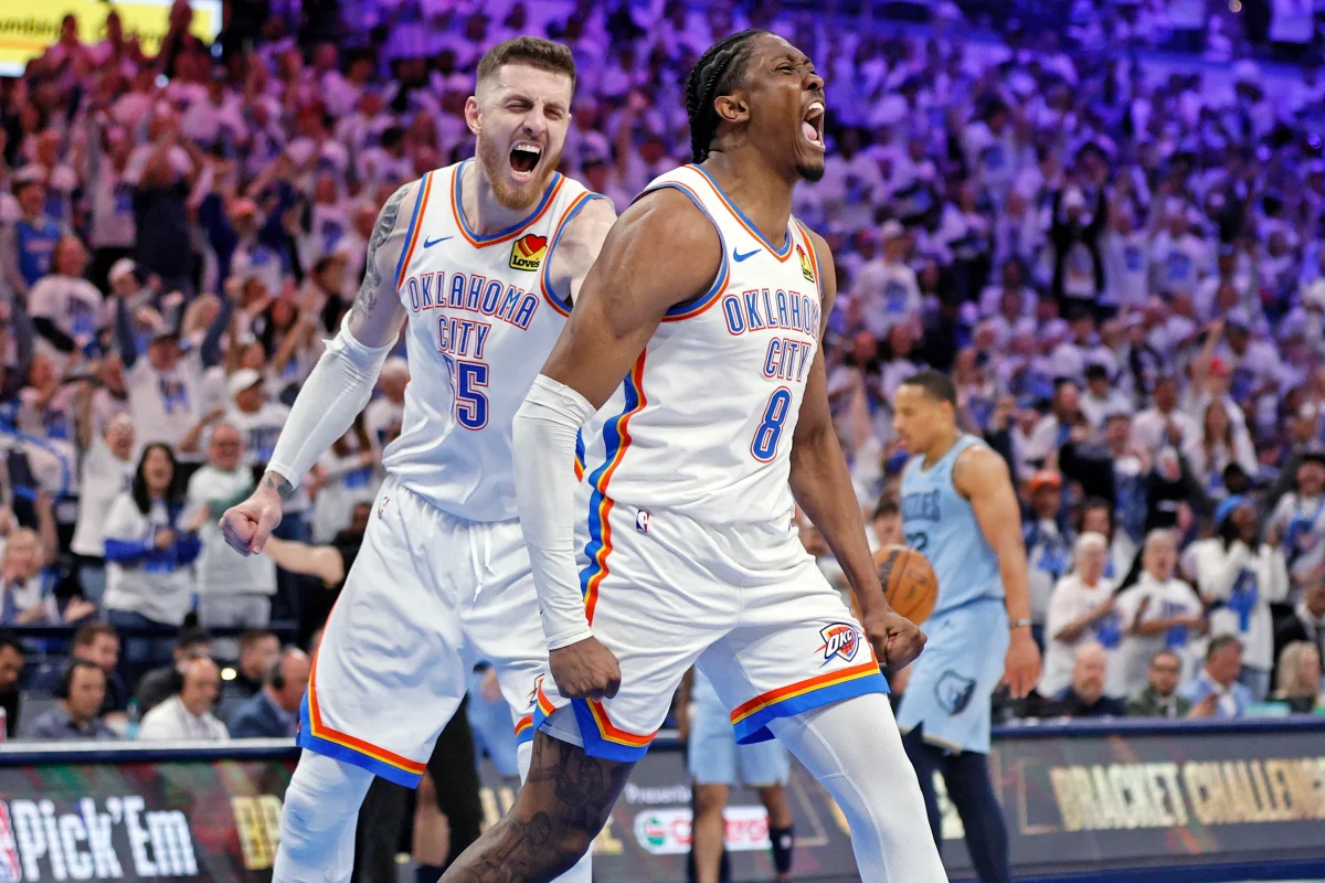 The Thunder’s Isaiah Hartenstein and Jalen Williams celebrate a playoff win. (Photo courtesy AP/Nate Billings)