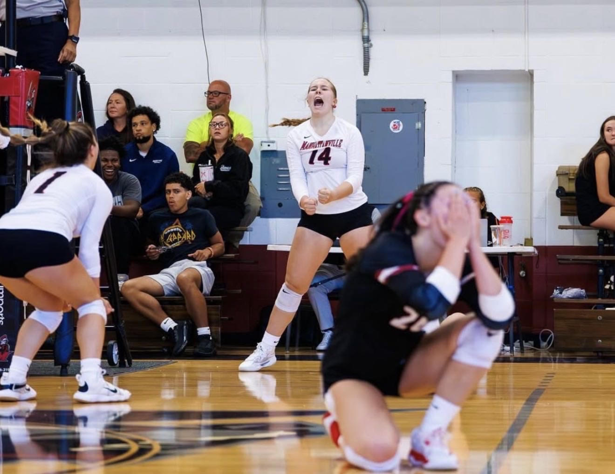 Freshman Cassidy Fallon (#14) celebrates with senior Samantha Andriola (#1) and junior Kayla Jennings (#26) after getting a kill at their season opener against Western Connecticut University on August 30th, 2025. (Photo courtesy govaliants.com)