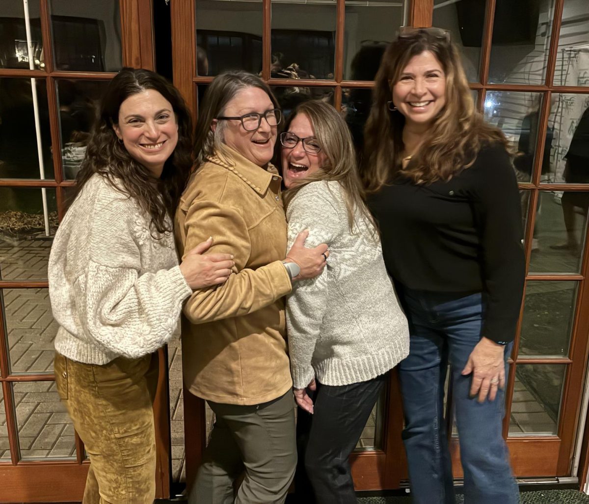 Left to right: Mrs. Pearl, Mrs. Schneider, Mrs. Barnes and Mrs. Galgano share a laugh. 
