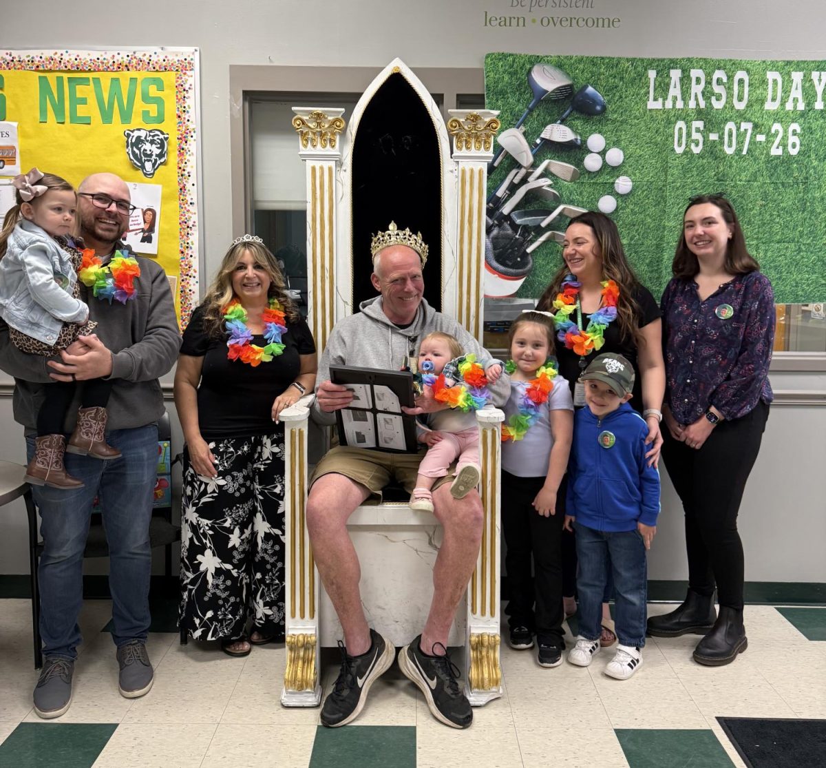 Mr. Olenius (center and throned) surrounded by his children and grandchildren.